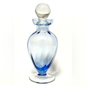 Vintage light blue glass perfume bottle. Clear glass stopper and pedesta…